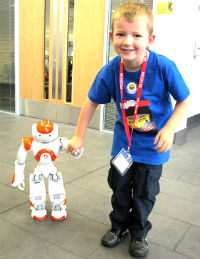 pyconuk 2014 robot being led by a child