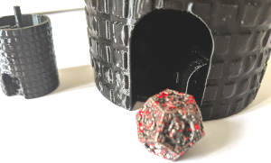 photo of dice tower printed with dice