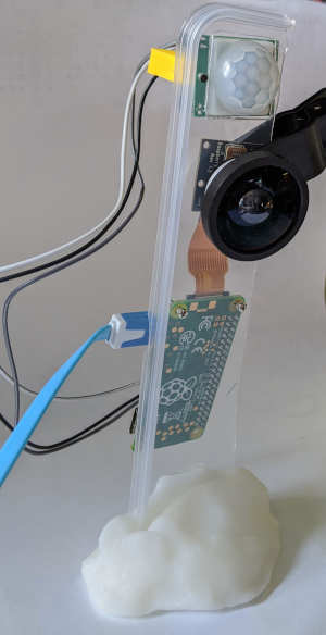 pi zero camera side showing use of eraser to cork nail