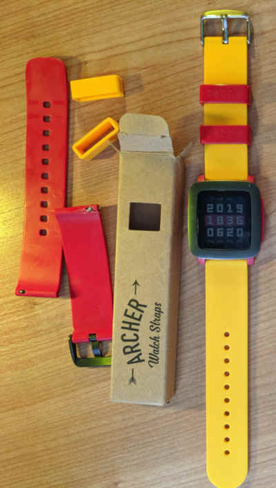 Pebble time watch with replacement archer strap, mustard yellow.